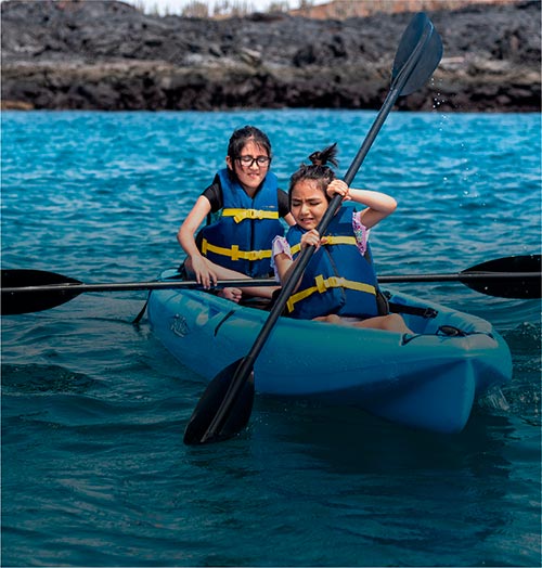 girls enjoying the sport Kayaking Alya Cruise to Galapagos