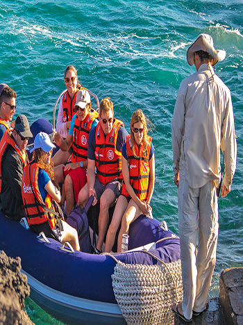 families doing the panga activity to learn about more species Endemic Catamaran cruise to Galapagos