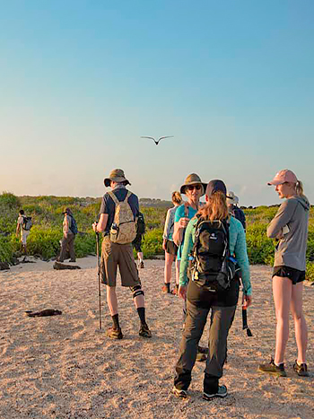 Guests hiking along the island's coasts cruise to Galapagos