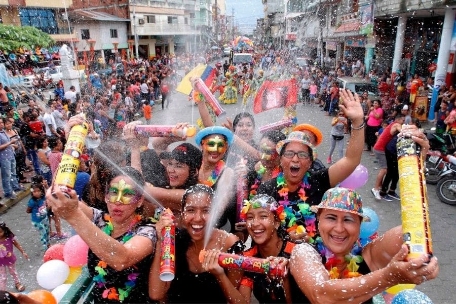 People celebrating carnival in Ecuador.