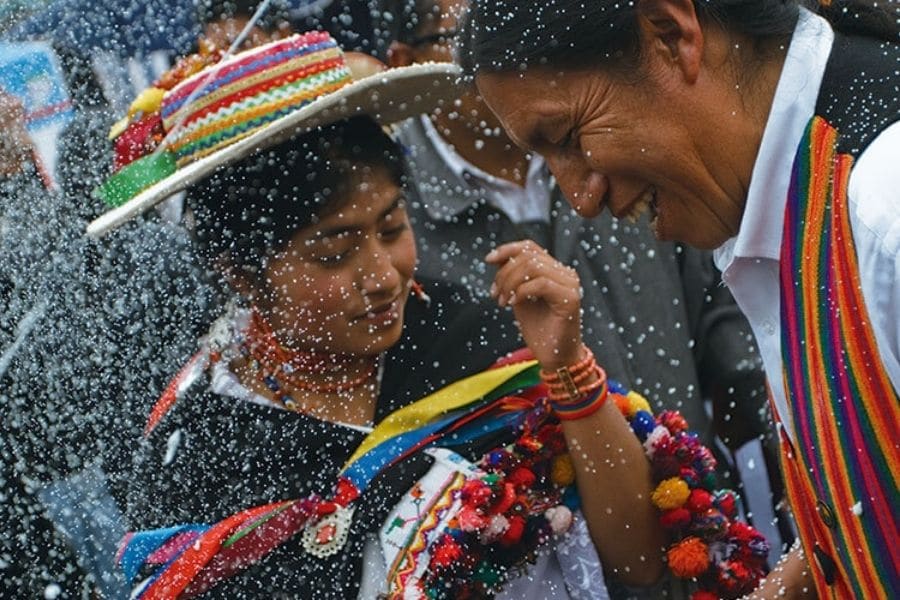 Ecuadorian indigenous people celebrating carnival
